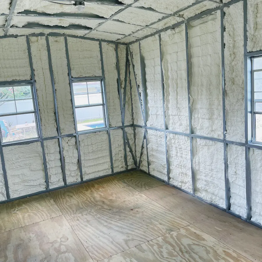 Closed-cell spray foam insulation applied to wall cavities in a residential project in Cedar Rapids